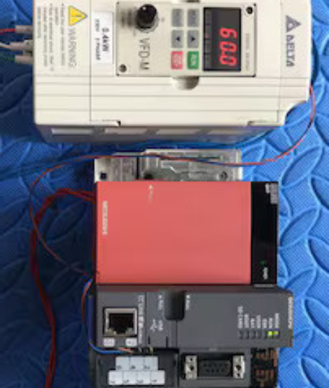 Inside view of a VFD panel showing cooling fans and wiring